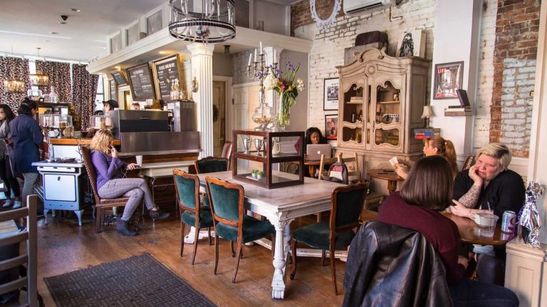 Customers in Urban Vintage in the Clinton Hill neighborhood of Brooklyn on April 6, 2015. Neighborhood Feature on Clinton HIll.