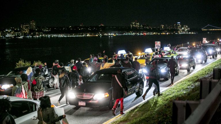 Protesters shut down traffic on the West Side Highway in Manhattan Nov. 25, 2014, after the announcement that a grand jury in Missouri declined to indict the police officer who killed unarmed Michael Brown.