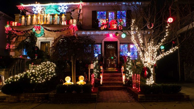 Christmas lights festoon houses large and small on Bay Ridge Parkway in Brooklyn's Dyker Heights.