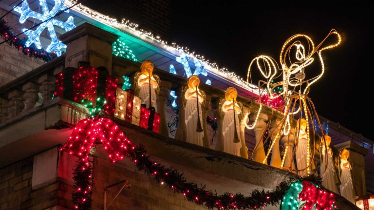 Illuminated angels on the second floor of a home on Bay Ridge Parkway in Brooklyn's Dyker Heights.