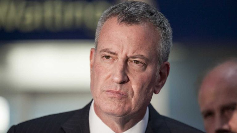 Responding to criticism from a spokeswoman for the governor, Mayor Bill de Blasio said on Monday, Nov. 30, 2015, that his Albany counterpart should do more to help out on homelessness.