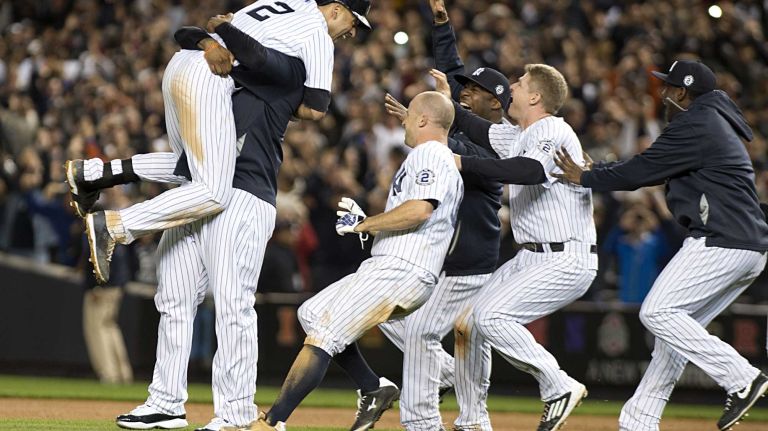 Derek Jeter's final game at Yankee Stadium 93 Yankees' Derek Jeter gets a big hug from CC Sabathia and the team after hitting a ninth-inning, game-winning base hit against the Baltimore Orioles at Yankee Stadium on Thursday, Sept. 25, 2014.