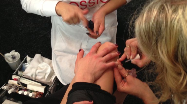 Backstage at New York Fashion Week 20 Essie manicurists work to get models' nails ready before the Rebecca Minkoff show.