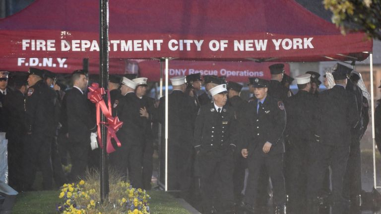 Firefighters, friends, and loved ones gather and pay their respects at the wake for fallen FDNY firefighter William Tolley at Chapey and Sons Funeral home in Bethpage on April 25, 2017.