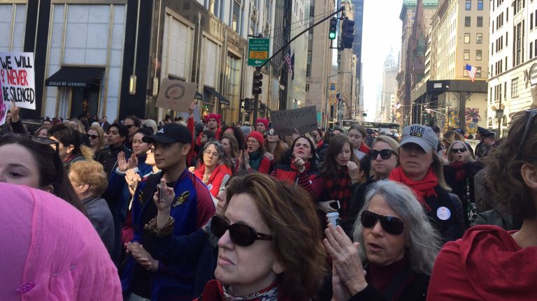 Crowds gather at the A Day Without a Woman rally held near 59th Street and Fifth Avenue in Manhattan on Wednesday, March 8, 2017. 