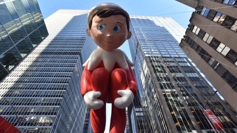 The Elf on the Shelf was not on his shelf as he floated above Sixth Avenue.