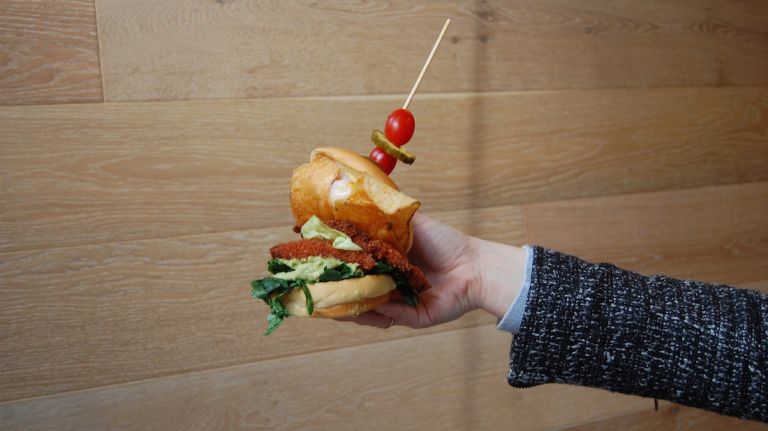 Uncle Sam's in NYC debuts fried chicken sandwich topped with Sriracha potato chips, poached egg 10 The ultimate question is: Why settle for one piece of chicken when you can have two?