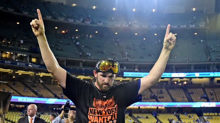 The New York Mets celebrate their National League Division Series victory over the Los Angeles Dodgers at Dodger Stadium in Los Angeles on Oct. 15, 2015.