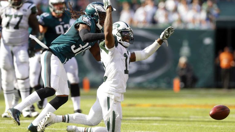 Jeremy Kerley #11 of the New York Jets can't come up with a pass in the fourth quarter as E.J. Biggers #38 of the Philadelphia Eagles defends during an NFL game at MetLife Stadium on Sept. 27, 2015.