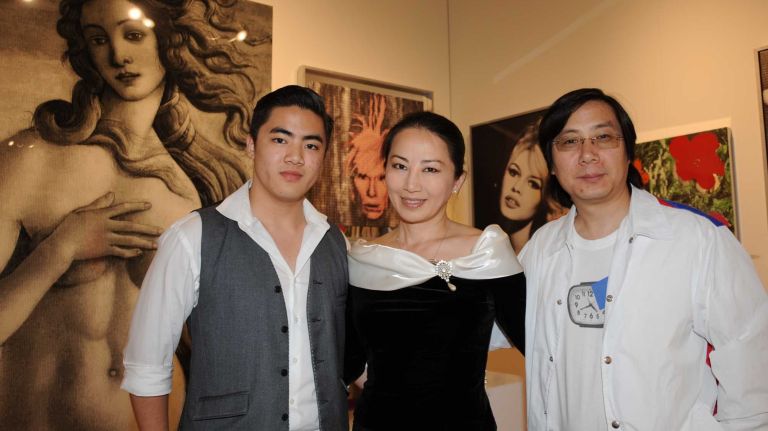 Tiger Lee, Tina Wong and Alex Cao attend the opening Thursday, July 2, 2015, of ArtHamptons in Bridgehampton.