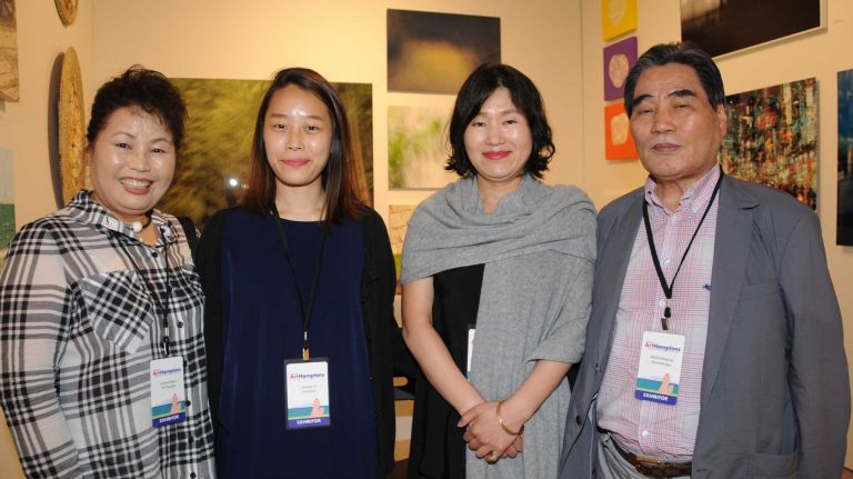 You Sung, left, Minju Sun, Susan Song and Ryoo Seok Woo attend the opening Thursday, July 2, 2015, of ArtHamptons in Bridgehampton.