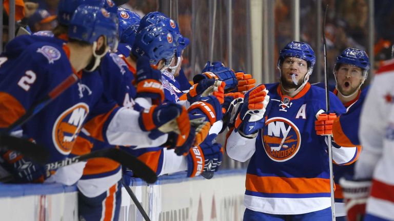 Kyle Okposo #21 of the New York Islanders celebrates his second-period goal against the Washington Capitals during Game 3 of the Eastern Conference quarterfinals at Nassau Coliseum on Sunday, April 19, 2015.