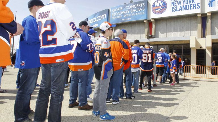 Fans arrive for Game 3 of the Eastern Conference quarterfinals between the New York Islanders and the Washington Capitals at Nassau Coliseum on Sunday, April 19, 2015.