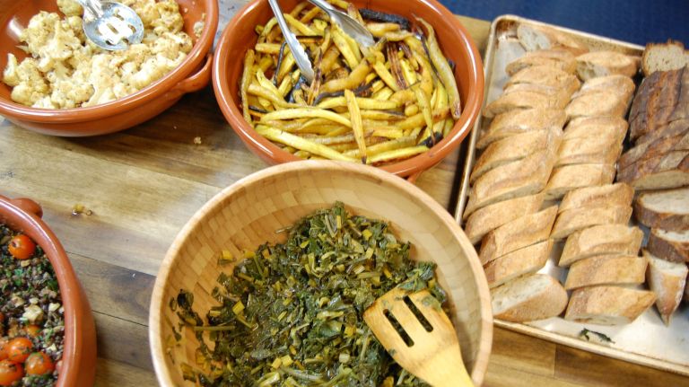 Chef Audrey Snyder prepares lunch for the staff four days a week. When we visited she made roast lamb with honey and rosemary and a plethora of vegetable and grain side dishes. She explained how end of summer lamb is different from spring lamb: Lambs grazed on pasture eat grass all summer long so their meat is more flavorful and rich. Spring lambs have consumed mostly milk, resulting in more delicate and sweet meat. 