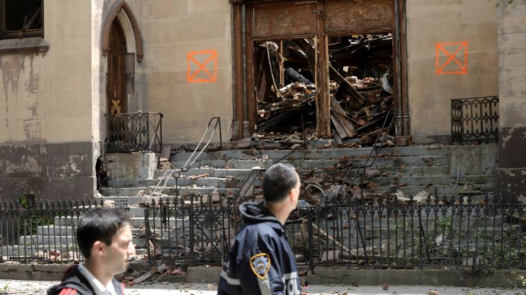 The fire ripped through the landmarked building, constructed in 1850 and shuttered 10 years ago, and took nearly two hours to bring under control, authorities said.