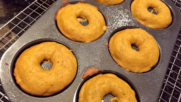 If you are overwhelmed by nervous energy that has tempted you to post a screed on social media, busy your hands by baking. You will be rewarded with something to stress eat, like these pumpkin doughnuts one amNY.com employee decided to bake early this morning when the election night adrenaline wouldn't wear off long enough to let her sleep.