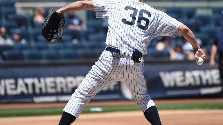Former New York Yankees pitcher David Cone delivers a pitch during the 70th annual Old-Timers' game at Yankee Stadium on Sunday, June 12, 2016.
