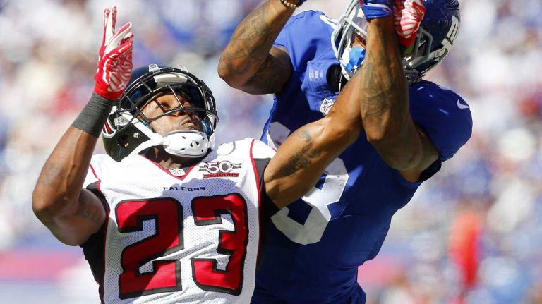 Robert Alford #23 of the Atlanta Falcons breaks up a pass intended for Odell Beckham #13 of the New York Giants during the second quarter at MetLife Stadium on Sunday, Sep. 20, 2015 in East Rutherford, New Jersey.