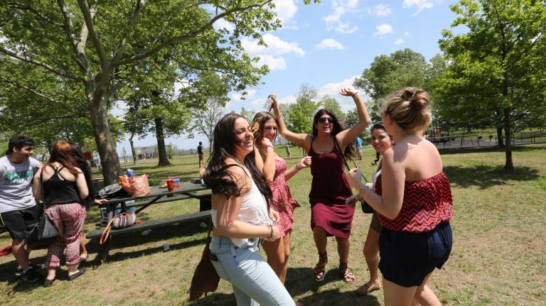 Seniors from Tottenville High School celebrate Senior Skip Day, and a few birthdays, in Wolfe's Pond Park in Prince's Bay, Staten Island, Friday, May 22, 2015.