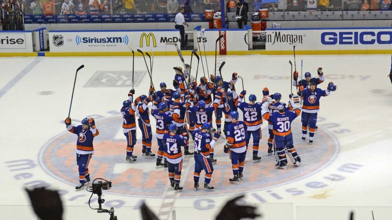 Eastern Conference quarterfinals Game 6: Islanders vs. Capitals 76 The New York Islanders salute their fans at center ice as they celebrate their victory over the Washington Capitals in Game 6 of the Eastern Conference quarterfinals at Nassau Coliseum on Saturday, April 25, 2015.
