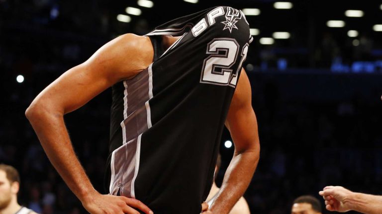 Tim Duncan of the San Antonio Spurs reacts during the fourth quarter during an NBA game at Barclays Center on Wednesday, Dec. 3, 2014.