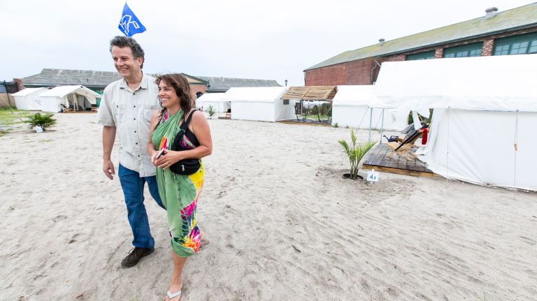David Donihue and his wife Kate Neuman of Manhattan at Camp Rockaway on the grounds of Riis Park Bathhouse on Friday.