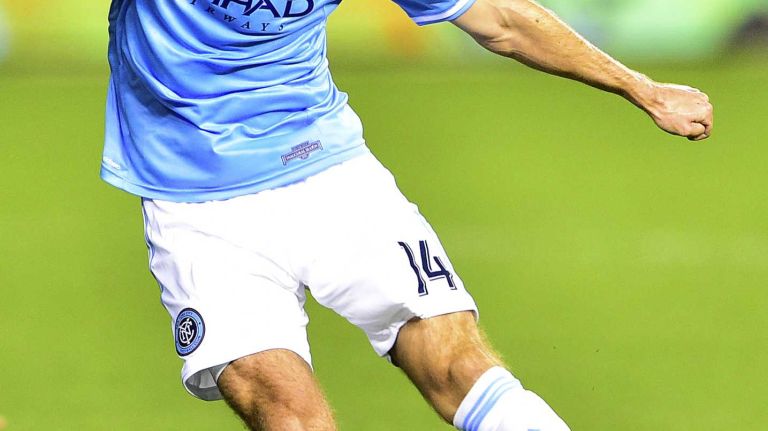 New York City FC forward Patrick Mullins shoots the ball toward the goal in an MLS game against Toronto FC at Yankee Stadium on Wednesday, Sept. 16, 2015.