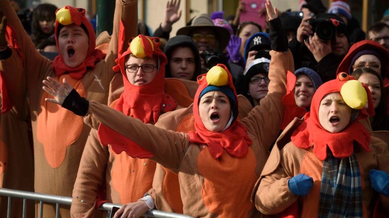 Spectators cheer during the 90th Macy's Thanksgiving Day Parade in Manhattan on Nov. 24, 2016.