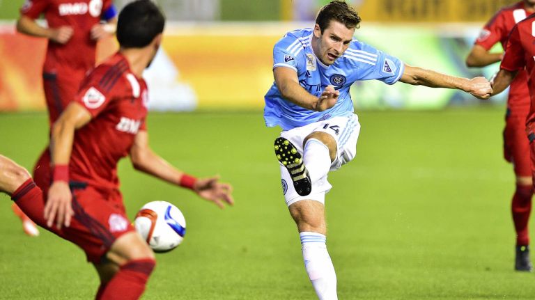 New York City FC forward Patrick Mullins shoots the ball toward the goal in an MLS game against Toronto FC at Yankee Stadium on Wednesday, Sept. 16, 2015.