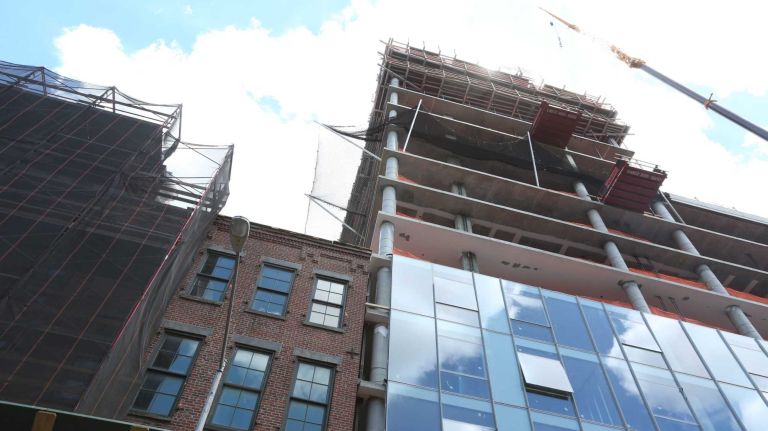 The old and the new along Water Street in Dumbo on June 6, 2014. 