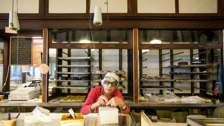 Glaser's Bake Shop attracts lines of sad New Yorkers looking for their last bite 7 Pamela Davenport a retire volunteers at the counter taking orders at Glaser's bakery in Manhattan, March 6, 2018.