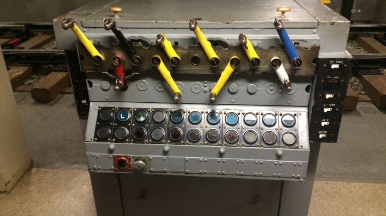 NYC's subway signal system: How it keeps trains from colliding and other things you probably never knew 8 Some signal classes are held in a room facing a series of antiquated subway interlocking switch and signal control boards that are still used in the system today. Levers on the control boards operate a fake set of tracks, where students can see how their actions trigger track switches or signals.
