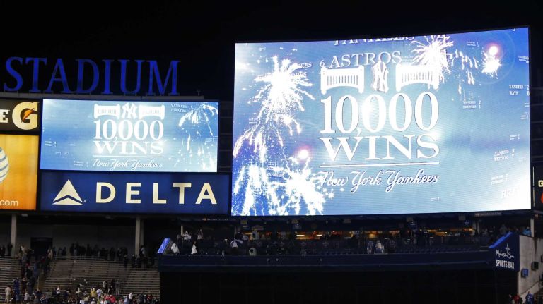 The scoreboard is seen after the New York Yankees defeated the Boston Red Sox at Yankee Stadium on Thursday, Oct. 1, 2015.