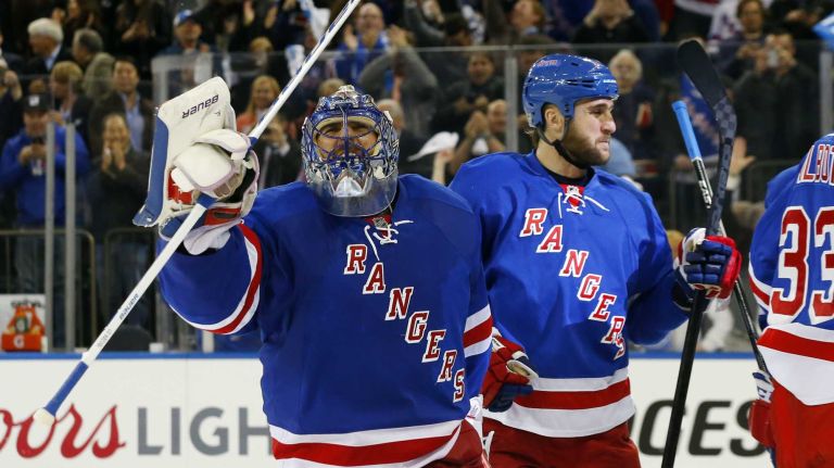 Henrik Lundqvist of the New York Rangers celebrates after defeating the Pittsburgh Penguins in overtime during Game 5 of the Eastern Conference Quarterfinals at Madison Square Garden on Friday, April 24, 2015.