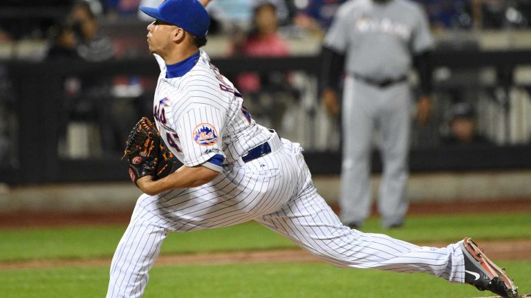 New York Mets relief pitcher Hansel Robles delivers a pitch against the Miami Marlins during a baseball game at Citi Field on Monday, September 14, 2015.
