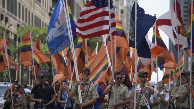 NYC Pride March 2016: See photos of the annual march to commemorate the Stonewall riots 128 A group of Boy Scouts gets ready for the start of the New York City Pride March on Fifth Avenue in Manhattan on Sunday, June 26, 2016. This year's Pride parade pays tribute to the 49 killed in the shooting at a gay nightclub in Orlando, Florida, two weeks ago on June 12.