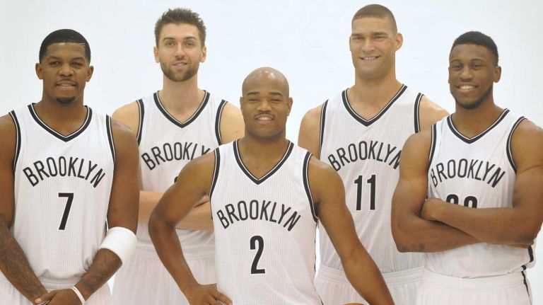 From left, Joe Johnson, Andrea Bargnani, Jarrett Jack, Brook Lopez and Thaddeus Young pose for portraits during Nets media day at the team's practice center in East Rutherford, N.J., on Monday, Sept. 28, 2015.