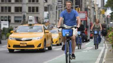Bicyclists ride on a bike lane on Broadway near 24th Street in Manhattan on Sept. 21, 2015. There are now 1,000 miles of bicycle lanes in New York City.