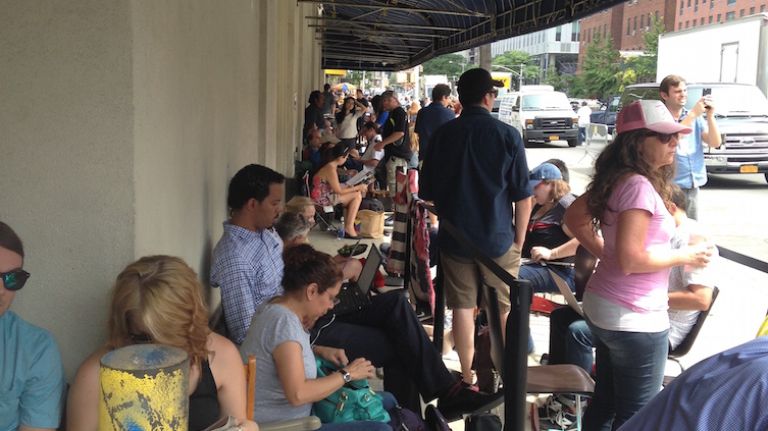 A line for seats began forming early Thursday, Aug. 6, 2015, outside the studio at 11th Avenue and West 52nd Street where Jon Stewart was to tape his final  