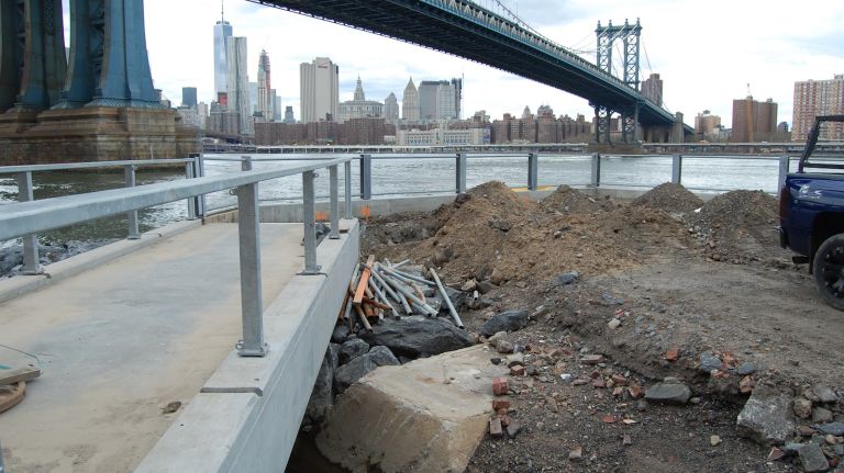 The John St. residential development, at the north end of Brooklyn Bridge Park in DUMBO, will feature paths and foot bridges over tidal waters that are open to the public. 