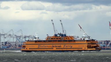 The Staten Island Ferry travels past some of NYC