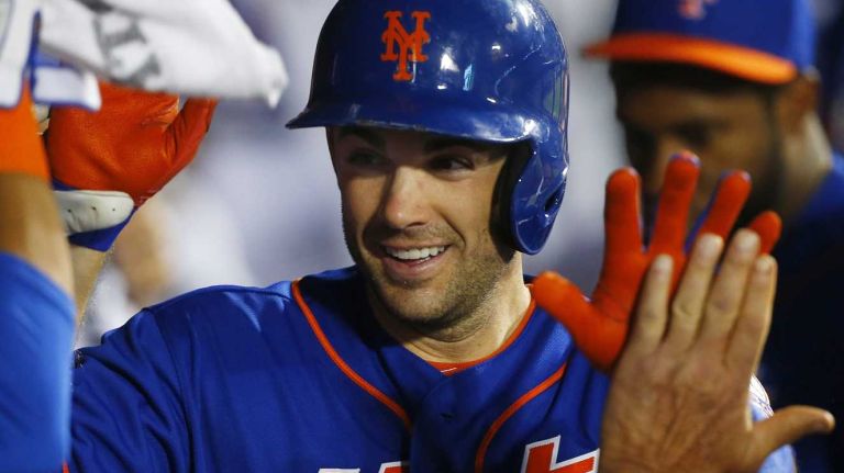 David Wright of the Mets celebrates his fifth inning two run home run against the Miami Marlins at Citi Field on Friday, July 11, 2014.