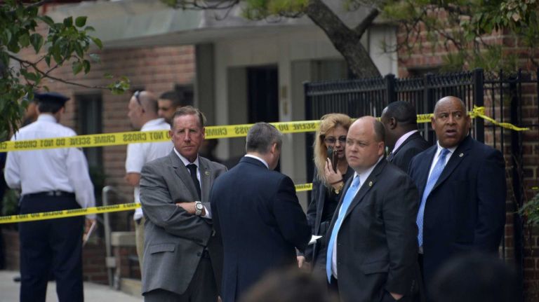 Firefighters who responded to a blaze at 143-40 Roosevelt in Flushing on Wednesday, Sept. 9, 2014 discovered the bodies of three Korean family members.