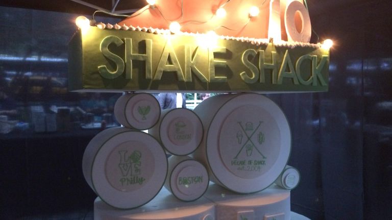 Shake Shack lines, Dominique Ansel cake fries for the Decade of Shack 1 Dominique Ansel made a 6-foot-tall anniversary cake for Shake Shack.
