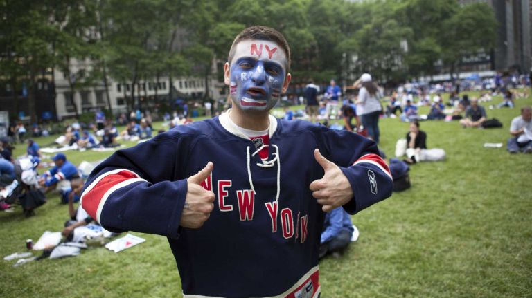 Kevin Mash from Queens poses as he joins a free outdoor viewing party at Bryant Park as Rangers take on Los Angeles Kings for Game 1, June 4th, 2014. 