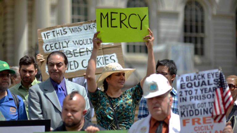 Supporters of jailed Occupy Wall Street protester Cecily McMillan hold a rally on the steps of City Hall demanding that elected officials grant clemency following her guilty verdit on May 12, 2014.