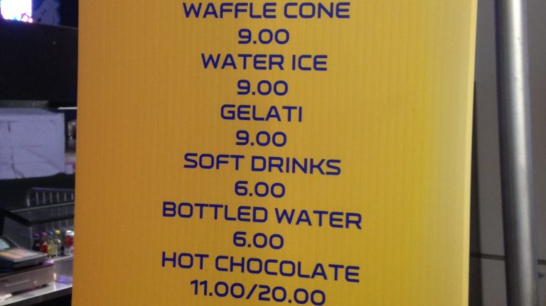 Signs at MetLife concession stands advertised the high-priced food and drink items for sale at this year's Super Bowl. 
