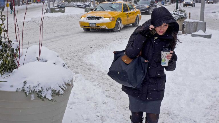Up to 10 inches of snow and cold winds forecasted for New York 1 A pedestrian battles the snow and wind on the Upper West Side. (Jan. 3, 2014)
