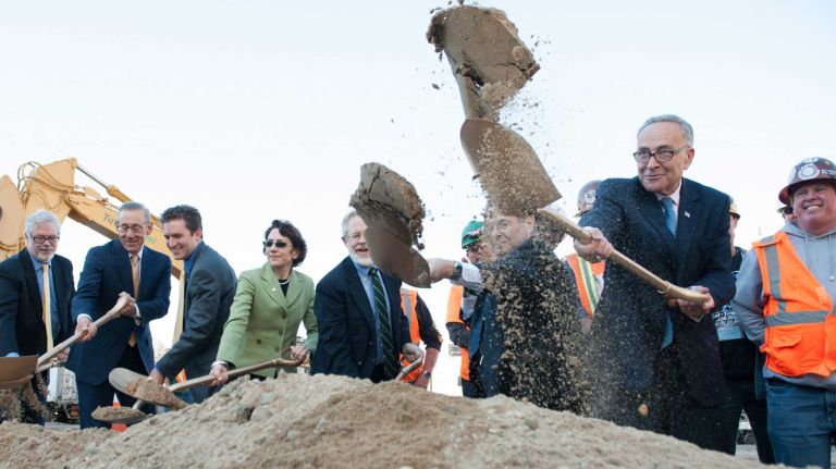 Dysfunctional rail planning hurts NY, NJ 1 Dignitaries, elected and government officials, including U.S. Senator Charles E. Schumer, right, participate in a ceremonial ground breaking at the Hudson Yards, where construction has already been started on a concrete casing to preserve the right-of-way for two new flood resistant tunnels into Manhattan's Penn Station. (Sept. 23, 2013)