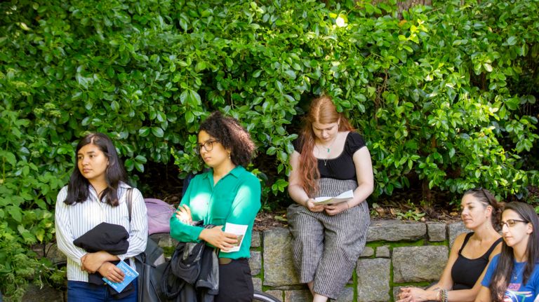 Students attend a course at University Open Air, which is held in Prospect Park's rose garden.&nbsp;